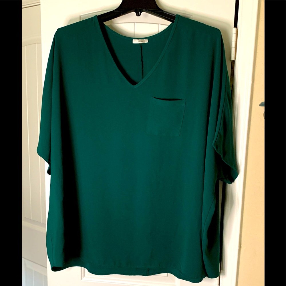 Boutique top in a beautiful emerald green.